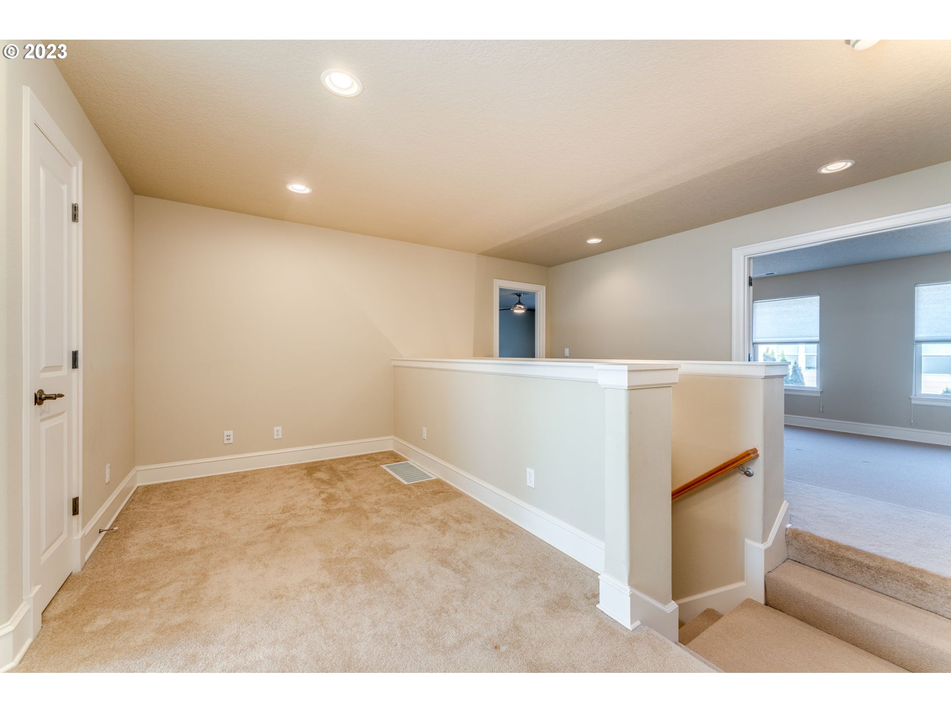12581 Northwest Forest Spring Lane Portland, OR 97229 - Photo 24 of 48 a view of a kitchen with furniture and an empty room