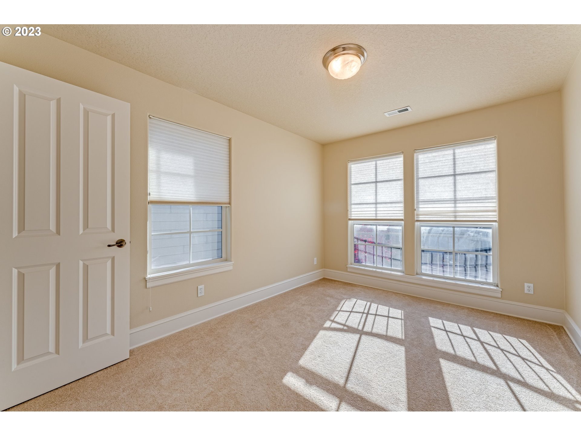 12581 Northwest Forest Spring Lane Portland, OR 97229 - Photo 27 of 48 a view of an empty room with a window