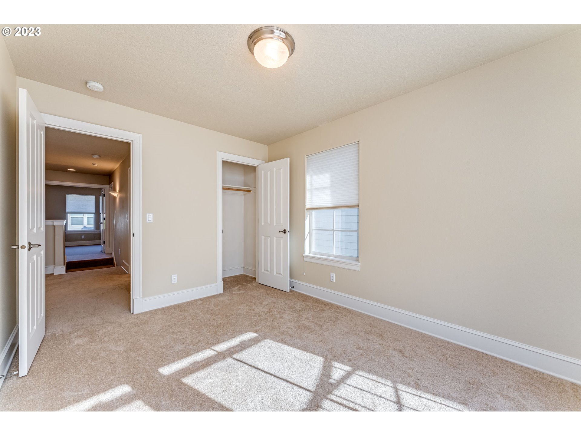 12581 Northwest Forest Spring Lane Portland, OR 97229 - Photo 28 of 48 a view of an empty room and window