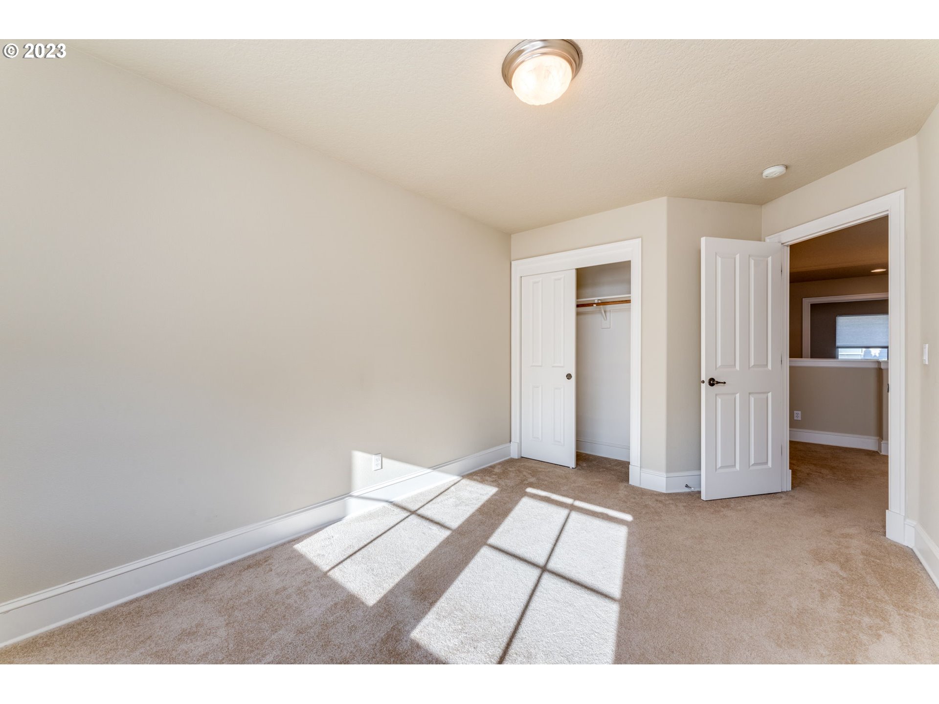 12581 Northwest Forest Spring Lane Portland, OR 97229 - Photo 30 of 48 a view of an empty room and window