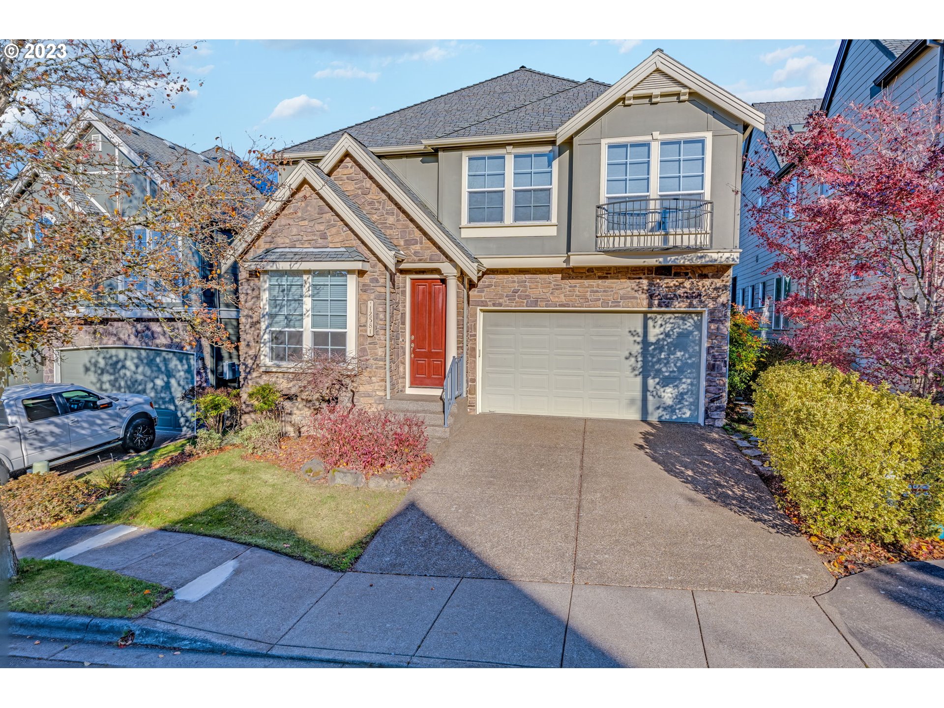12581 Northwest Forest Spring Lane Portland, OR 97229 - Photo 3 of 48 a view of a house with yard