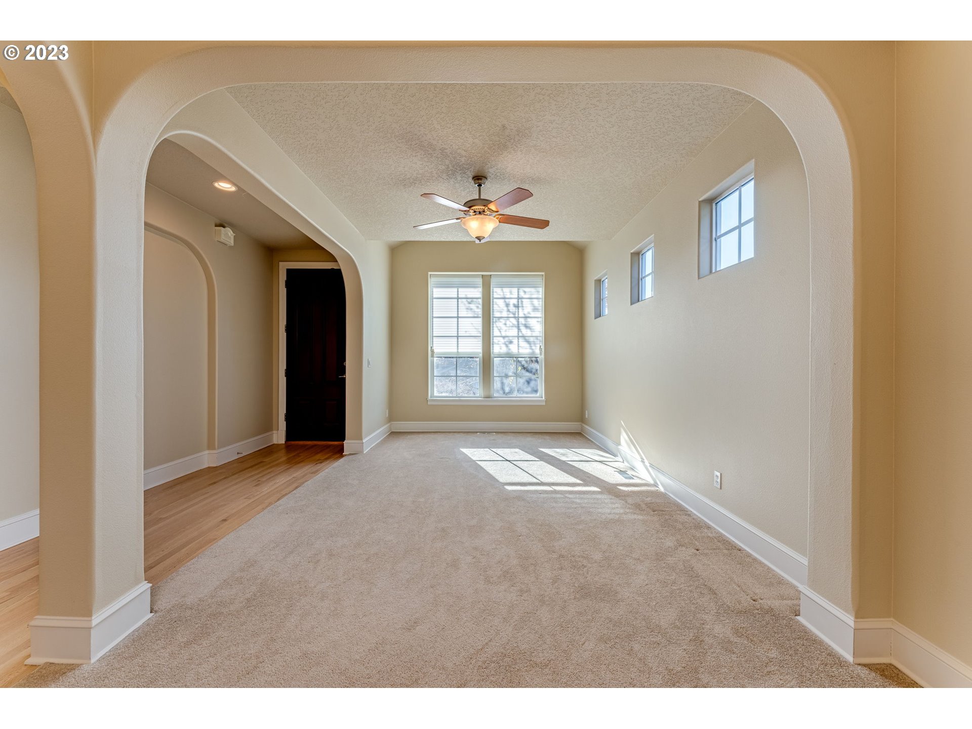 12581 Northwest Forest Spring Lane Portland, OR 97229 - Photo 6 of 48 a view of entryway and hall with a window