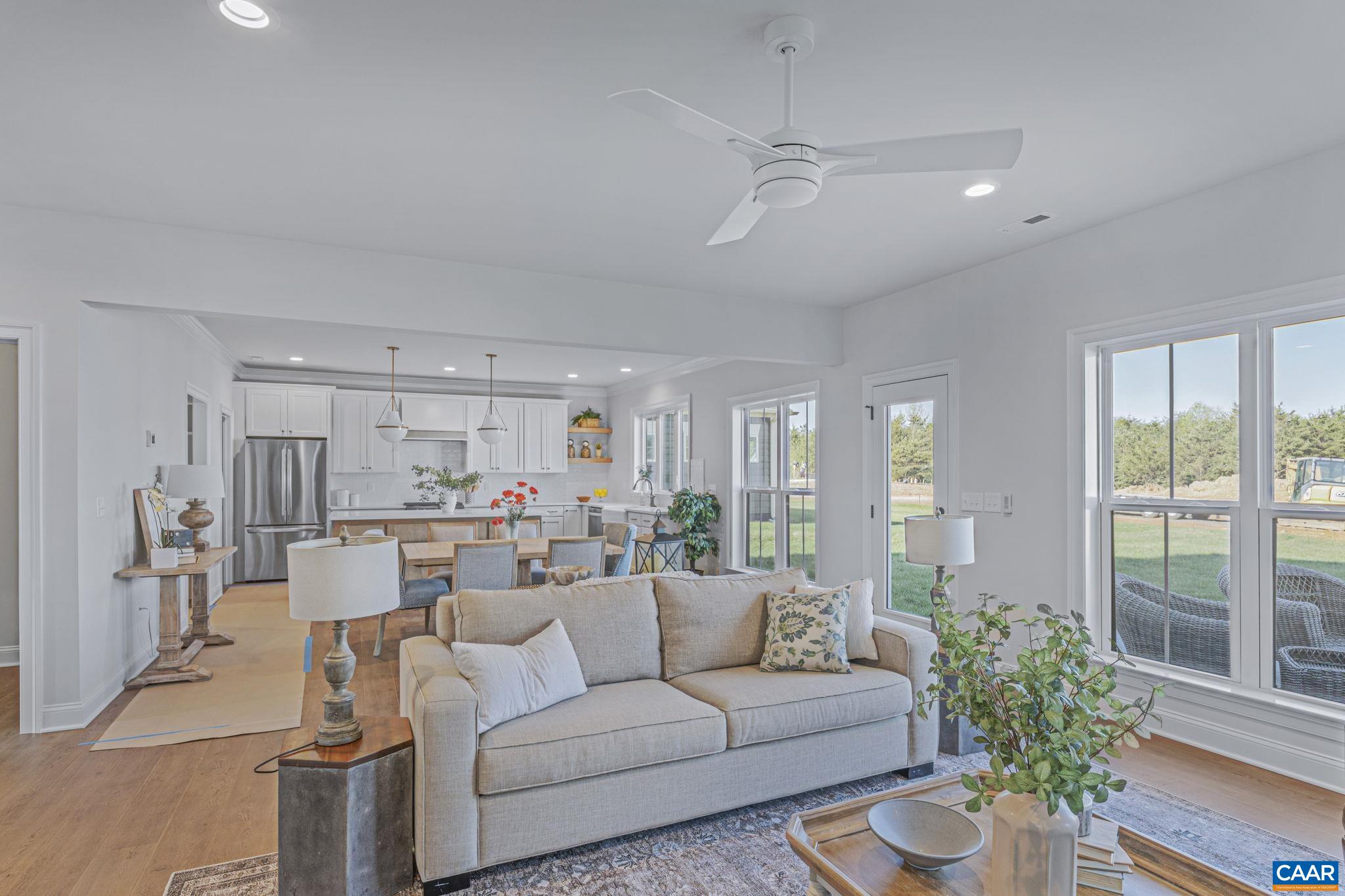 115226 Riparian Court Charlottesville, VA 22911 - Photo 12 of 49 a living room with furniture and a large window