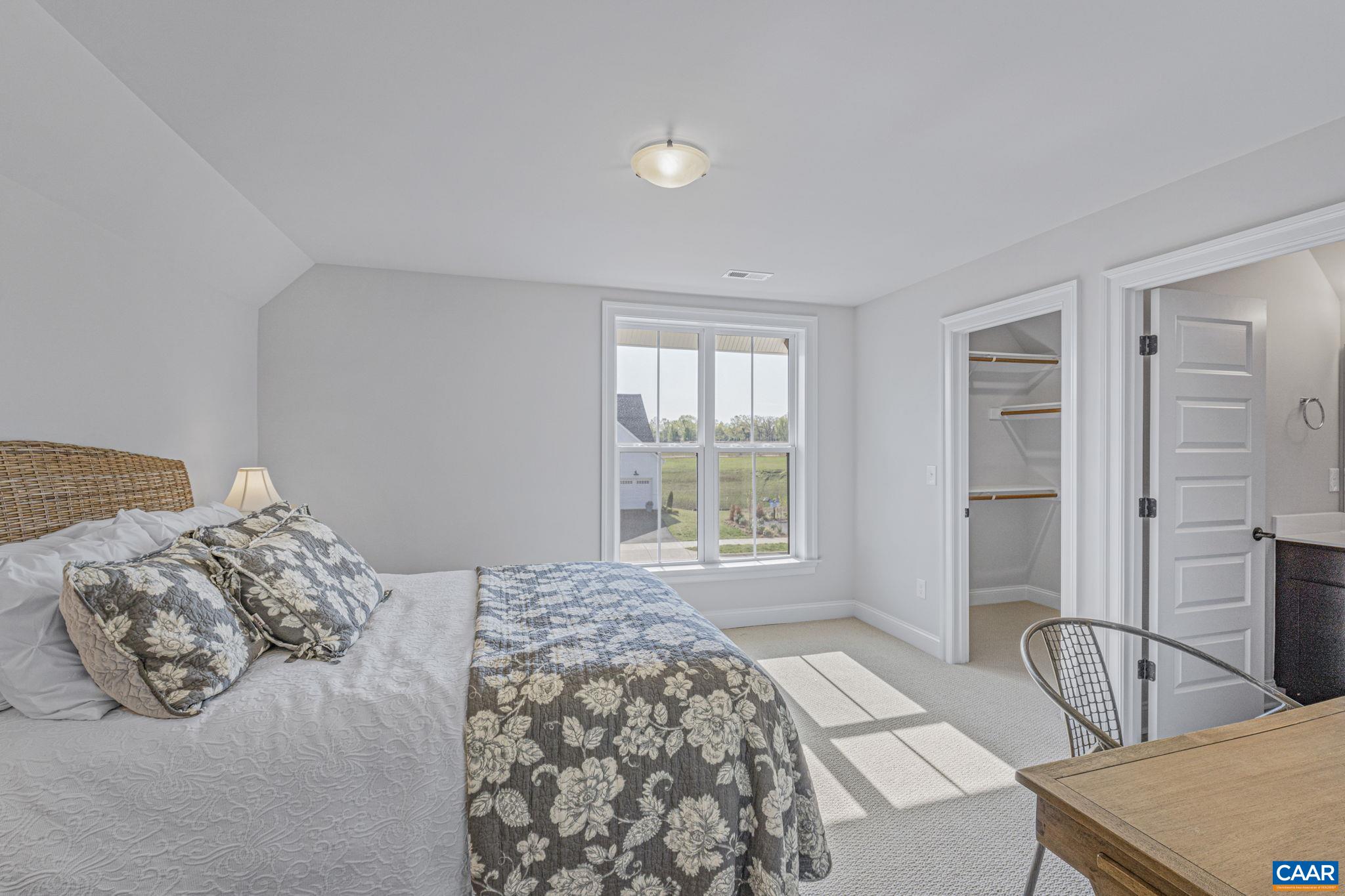 115226 Riparian Court Charlottesville, VA 22911 - Photo 34 of 49 a bedroom with a bed and a window