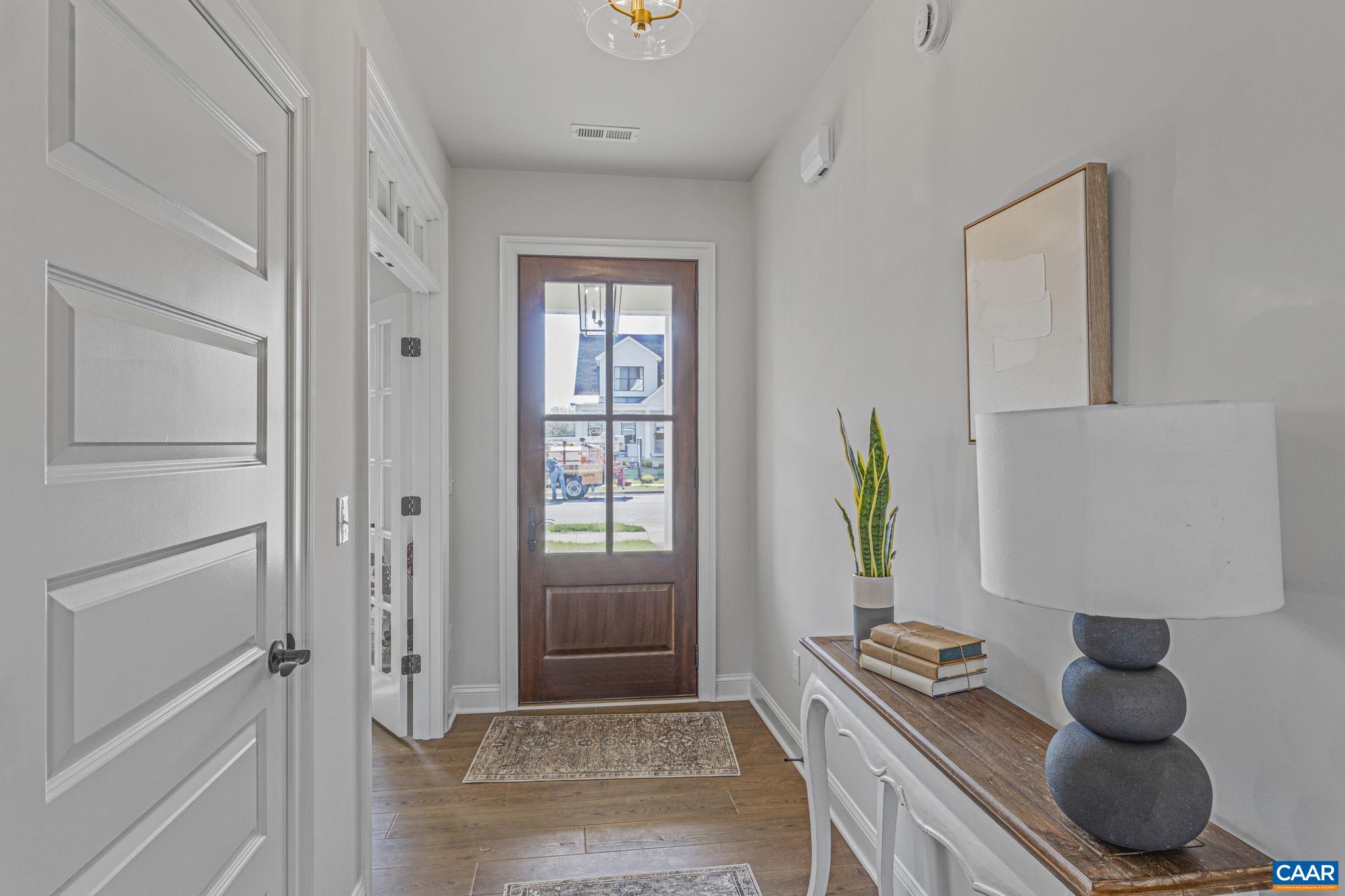115226 Riparian Court Charlottesville, VA 22911 - Photo 5 of 49 a room with furniture and a window