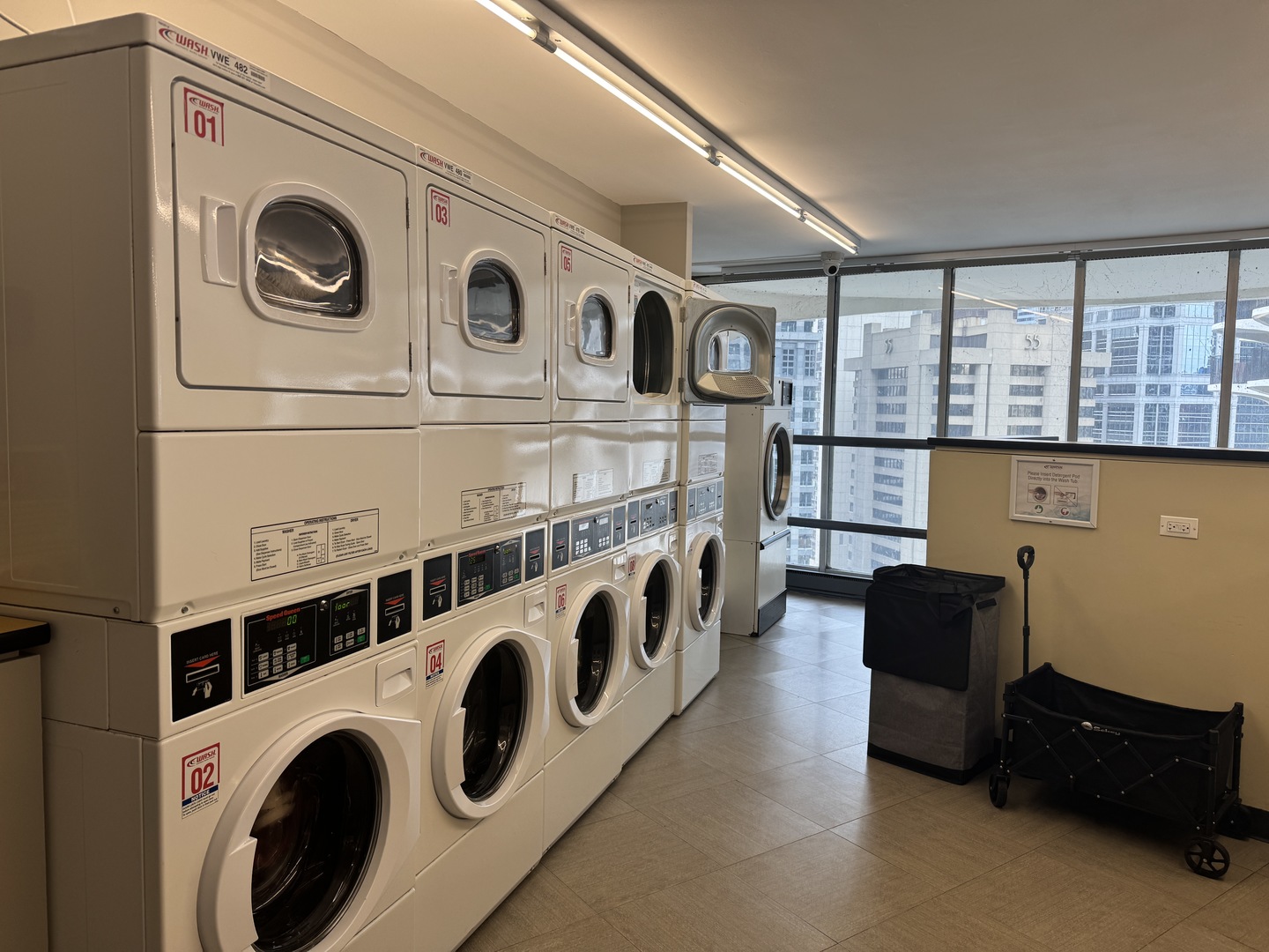 300 North State Street, Unit 4725 Chicago, IL 60654 - Photo 15 of 19 a view of entryway with washer and dryer