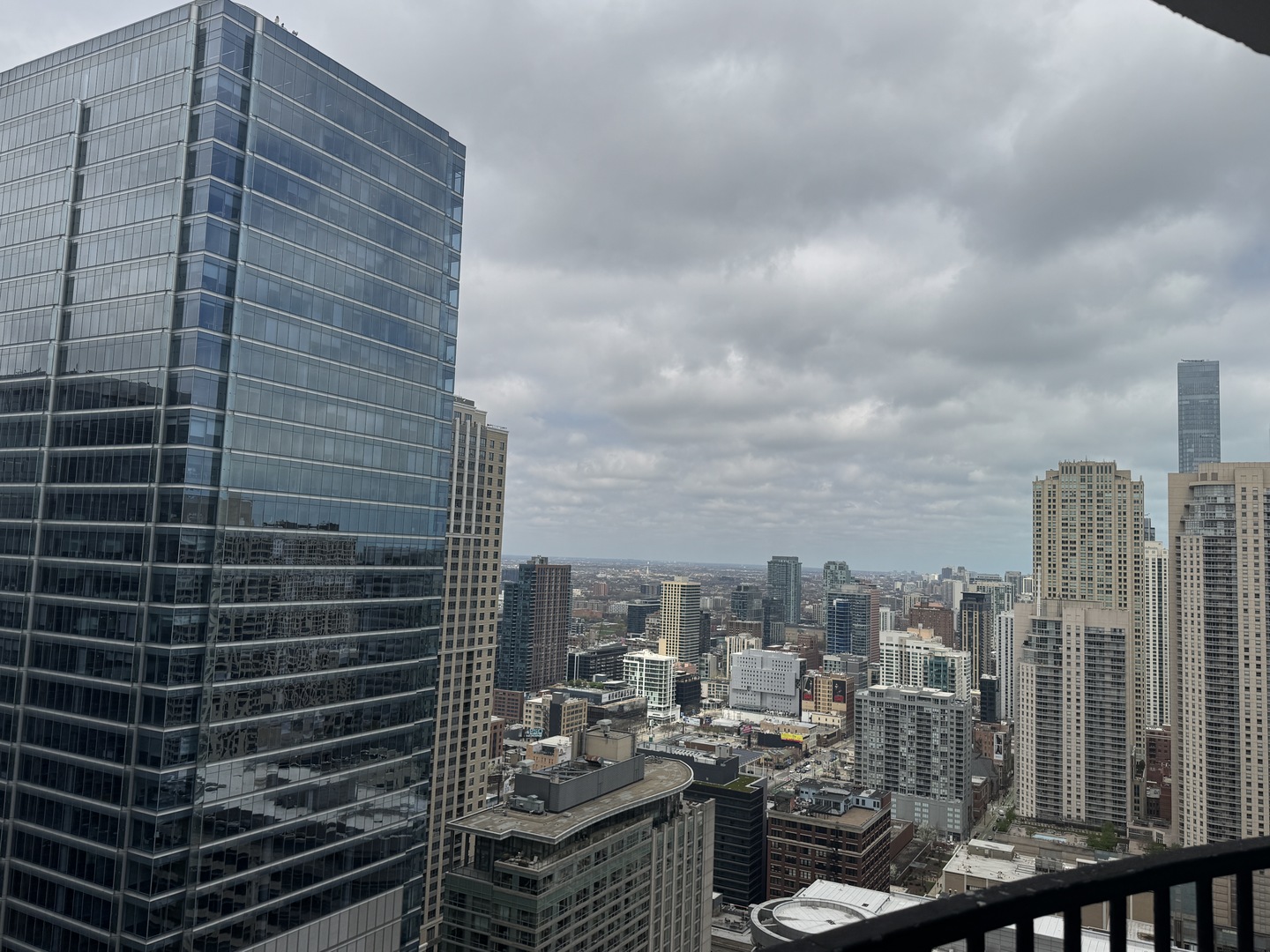 300 North State Street, Unit 4725 Chicago, IL 60654 - Photo 8 of 19 a view of a city with tall buildings