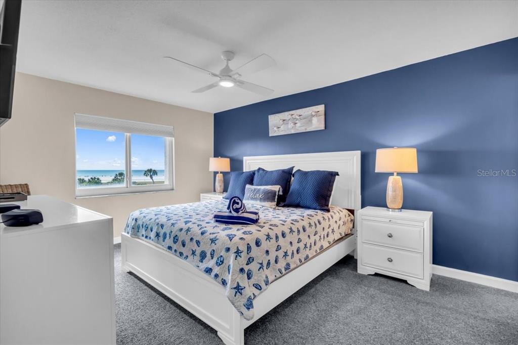 757 Beach Road, Unit 310 Sarasota, FL 34242 - Photo 11 of 31 a bedroom with a bed and window