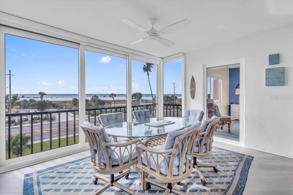 757 Beach Road, Unit 310 Sarasota, FL 34242 - Photo 20 of 31 a view of a dining room with furniture window and outside view