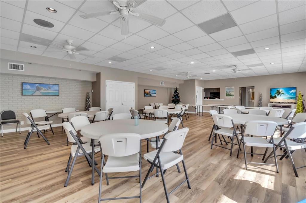 757 Beach Road, Unit 310 Sarasota, FL 34242 - Photo 27 of 31 a view of a dining room with furniture