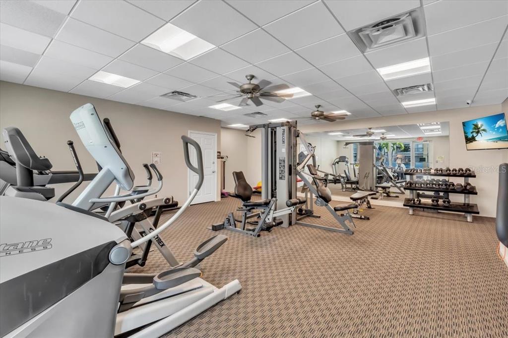 757 Beach Road, Unit 310 Sarasota, FL 34242 - Photo 28 of 31 a view of a room with gym equipment