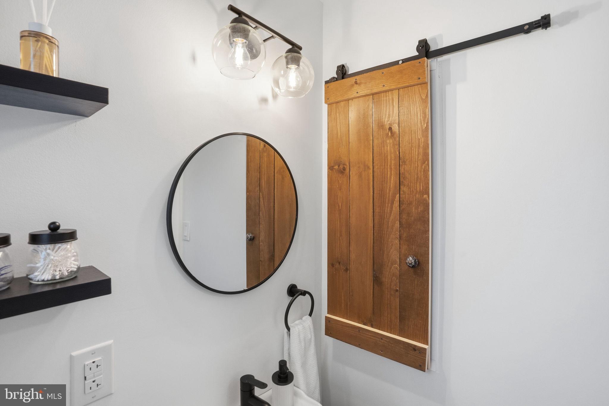 303 Radcliffe Road Glenside, PA 19038 - Photo 15 of 36 a bathroom with a sink and a mirror