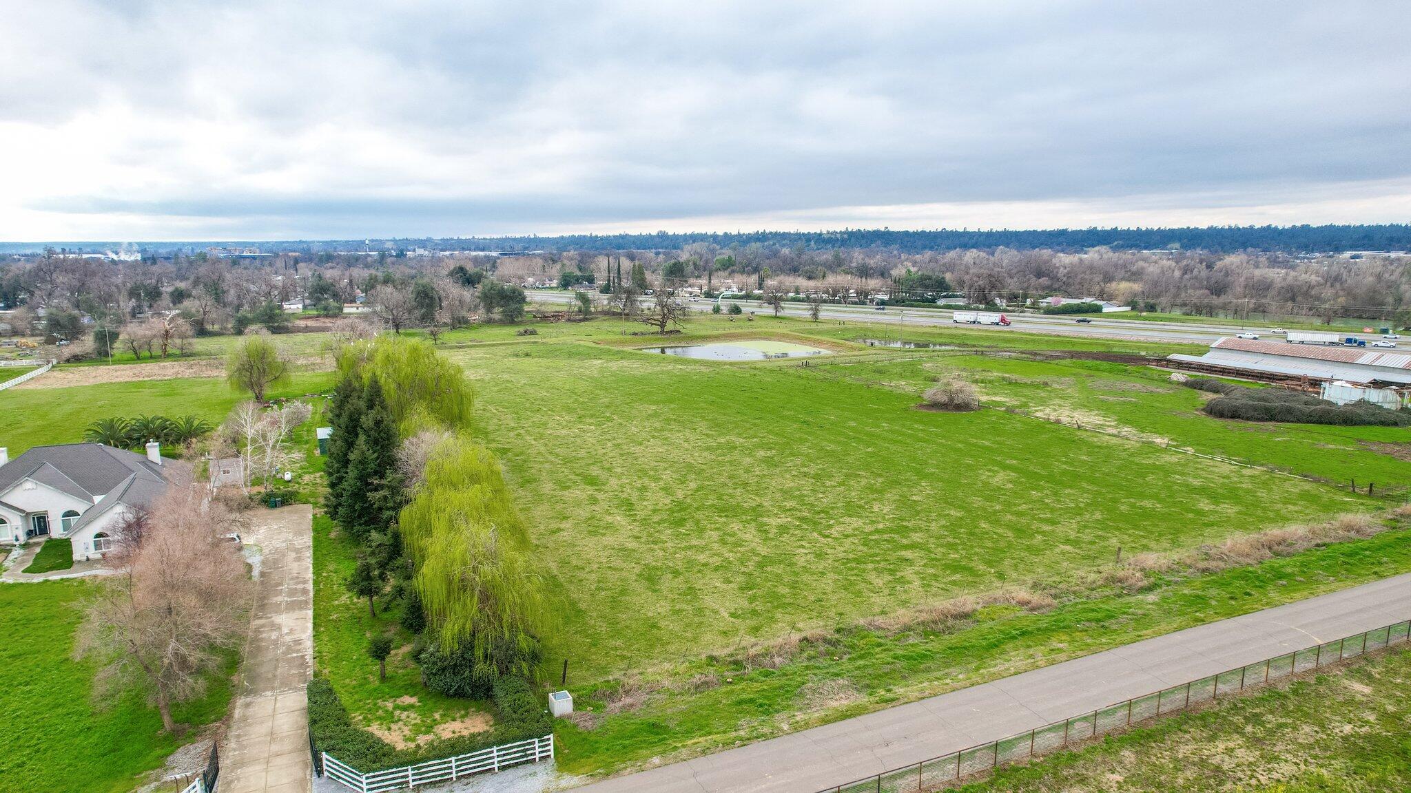 Milky Way Redding, CA 96002 - Photo 13 of 16 an aerial view of residential houses with outdoor space and swimming pool