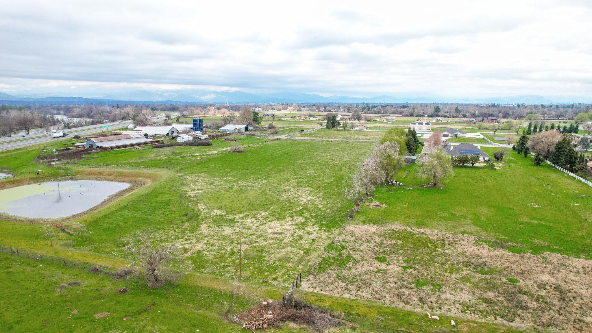 Milky Way Redding, CA 96002 - Photo 14 of 16 a view of a lake with houses in the back