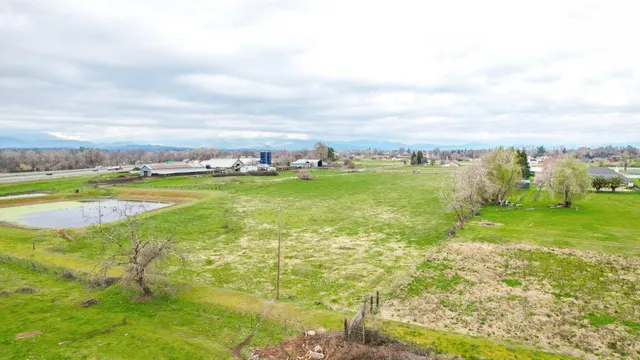 a view of a lake with a big yard