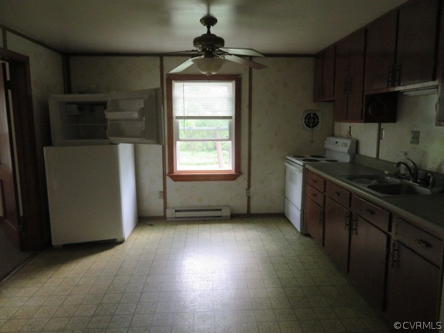 12700 Nash Road Chesterfield, VA 23838 - Photo 12 of 50 a kitchen with stainless steel appliances granite countertop a sink a stove and a refrigerator