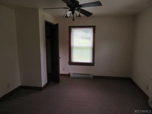 12700 Nash Road Chesterfield, VA 23838 - Photo 18 of 50 an empty room with a window and a ceiling fan