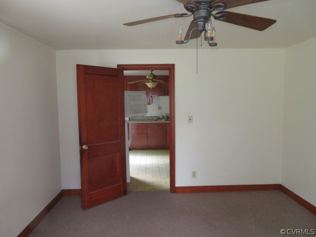 12700 Nash Road Chesterfield, VA 23838 - Photo 19 of 50 an empty room with chandelier fan