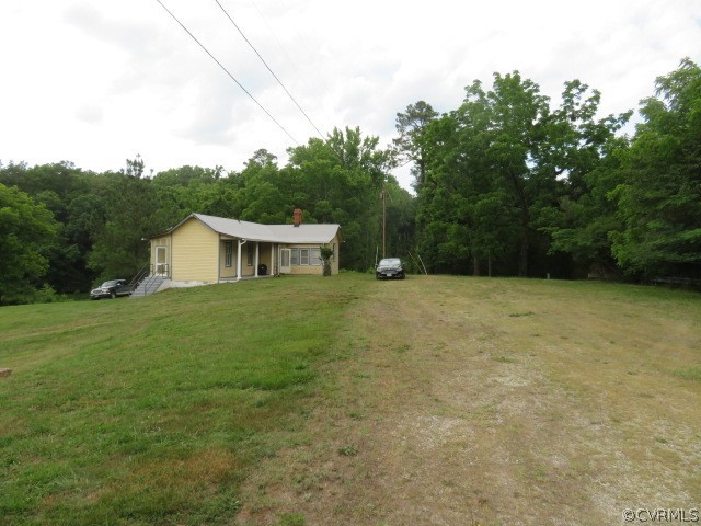 12700 Nash Road Chesterfield, VA 23838 - Photo 30 of 50 a front view of house with a garden