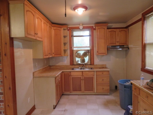 12700 Nash Road Chesterfield, VA 23838 - Photo 36 of 50 a kitchen with stainless steel appliances granite countertop a sink stove and refrigerator