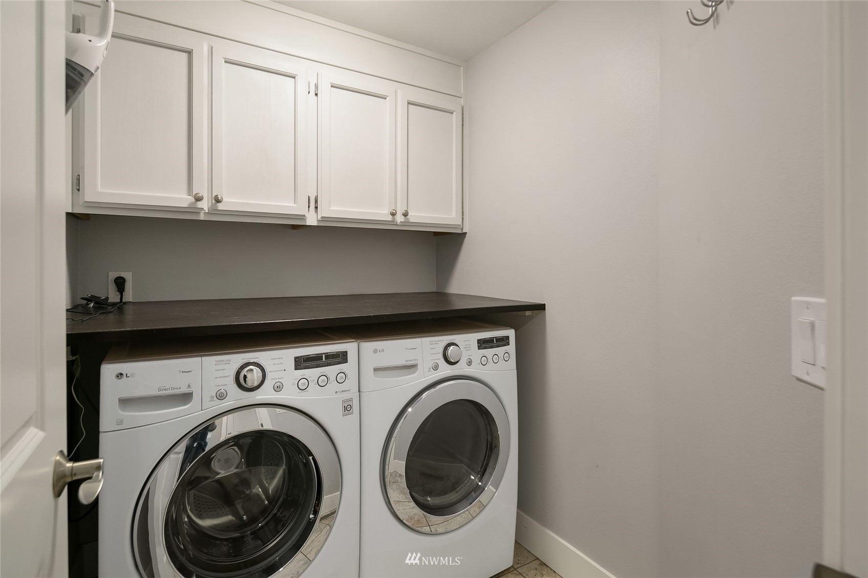 3228 211th Street Southeast Bothell, WA 98021 - Photo 16 of 40 a close up view of washer and dryer