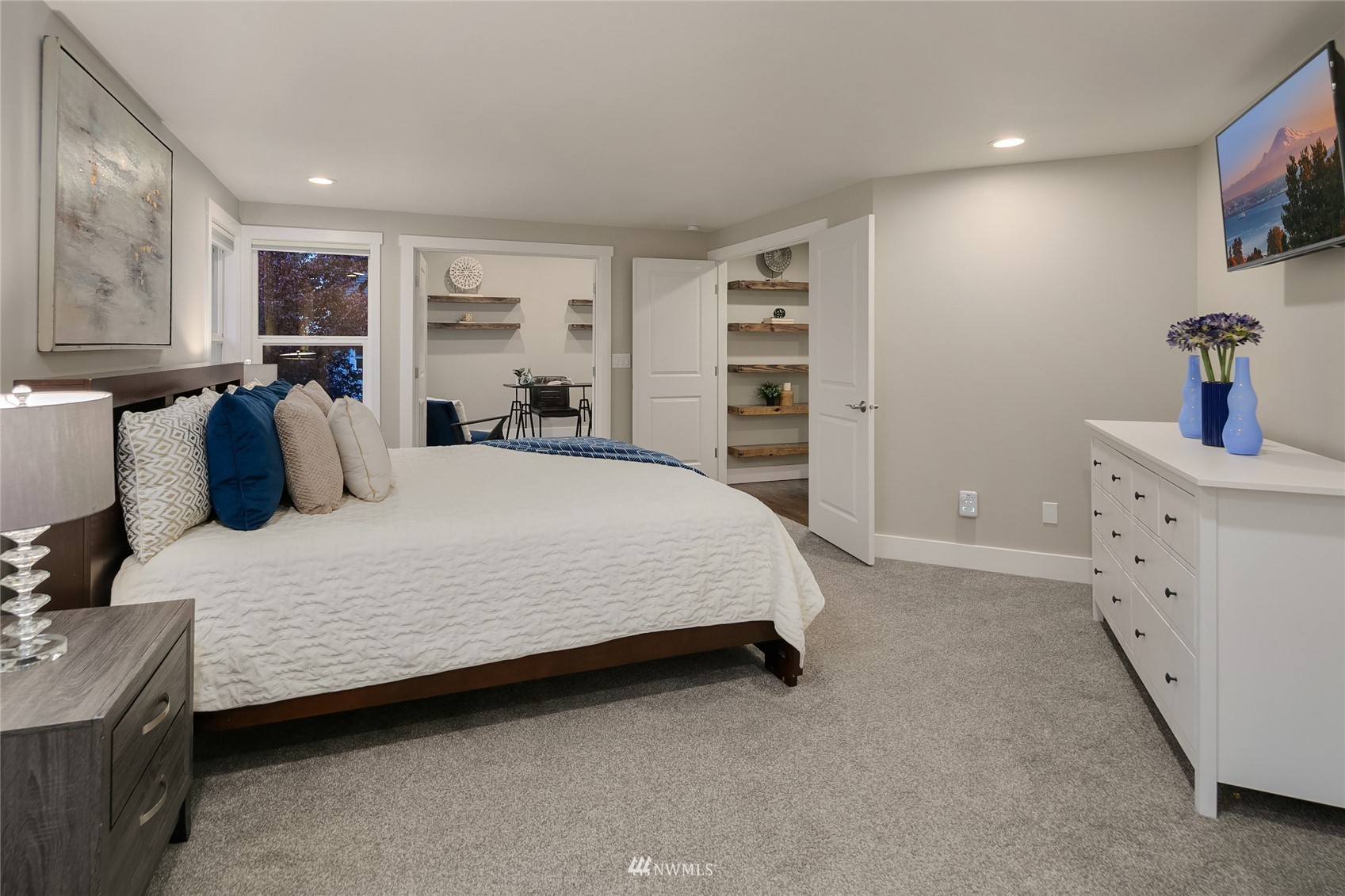 3228 211th Street Southeast Bothell, WA 98021 - Photo 22 of 40 a bedroom with a bed and a night stand