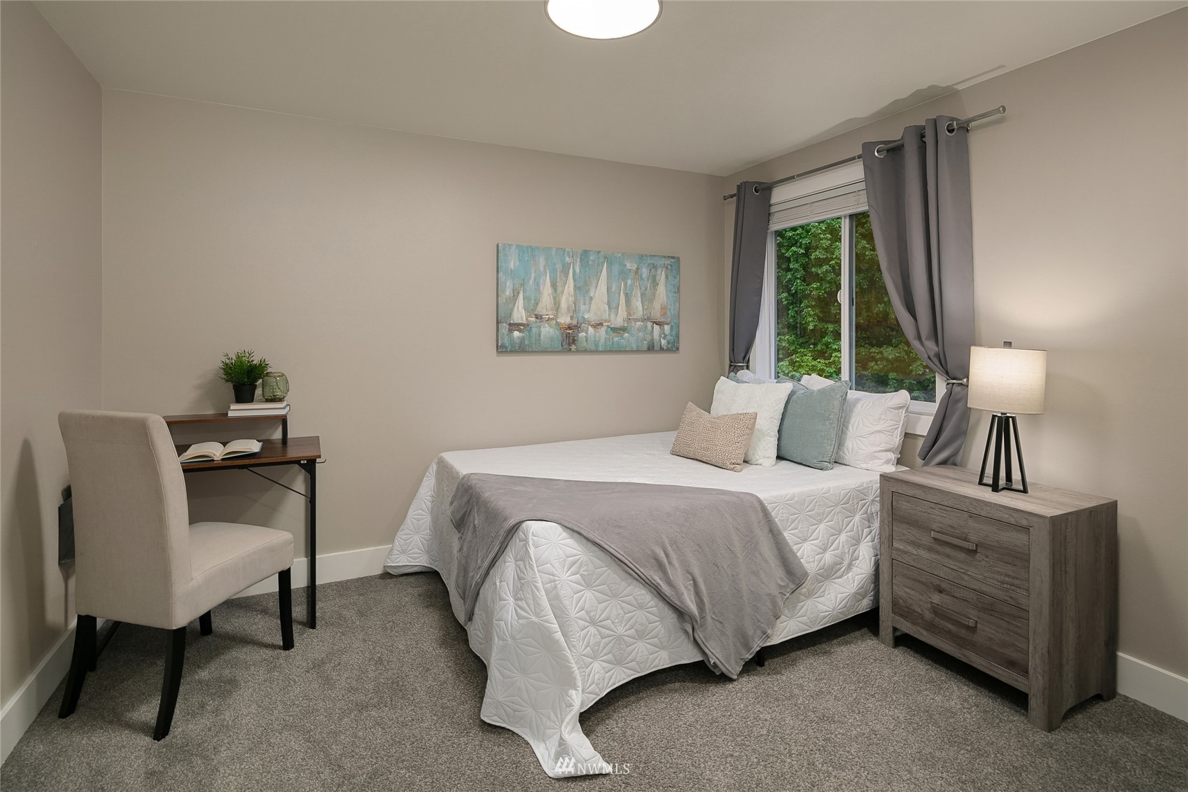 3228 211th Street Southeast Bothell, WA 98021 - Photo 26 of 40 a bedroom with a bed chair and window