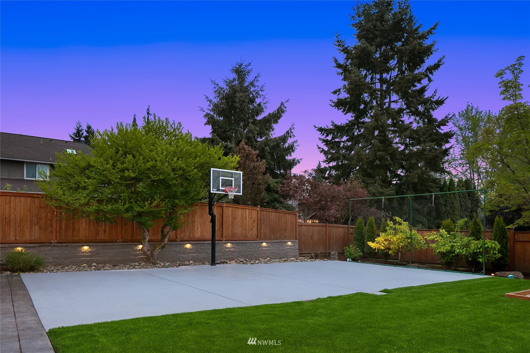 3228 211th Street Southeast Bothell, WA 98021 - Photo 36 of 40 a view of a house with a yard and a wooden fence