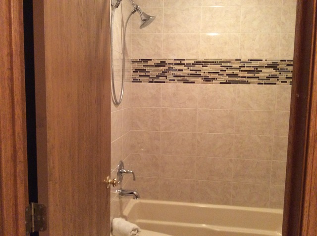 729 Rockhurst Road Bolingbrook, IL 60440 - Photo 12 of 20 a bathroom with a bathtub and shower