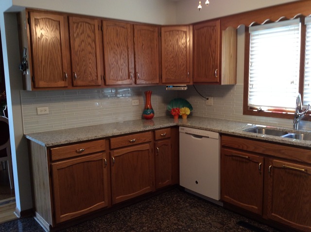 729 Rockhurst Road Bolingbrook, IL 60440 - Photo 7 of 20 a kitchen with stainless steel appliances granite countertop cabinets and window