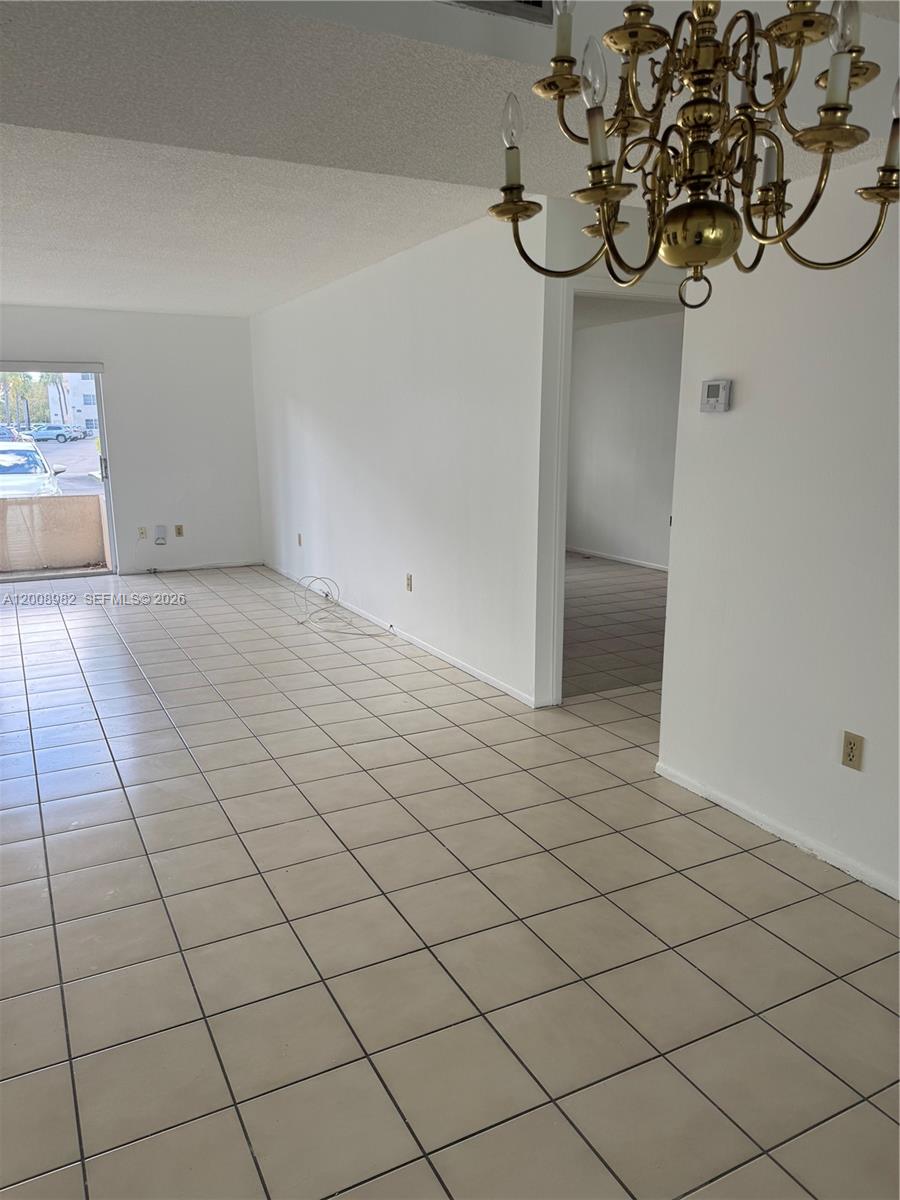 7747 Southwest 86th Street, Unit D105 Miami, FL 33143 - Photo 2 of 14 a view of a room & utility room