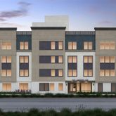 a front view of residential houses with street