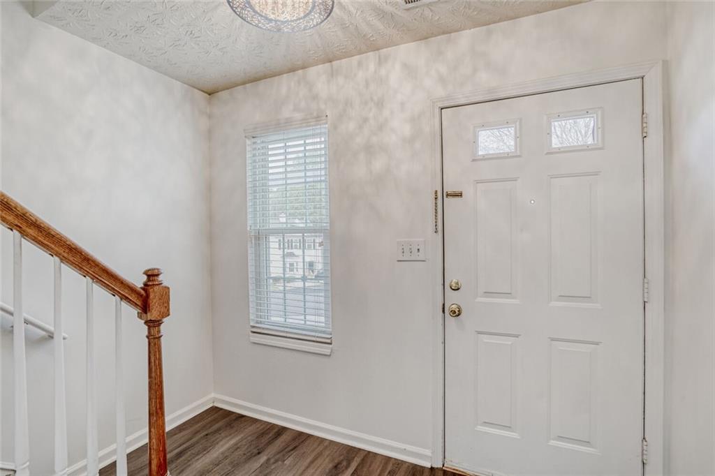 4120 Spring Cove Drive Duluth, GA 30097 - Photo 2 of 24 a view of front door with wooden floor