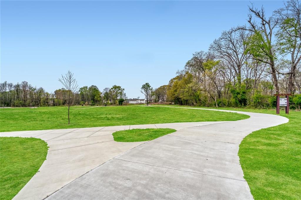 4120 Spring Cove Drive Duluth, GA 30097 - Photo 22 of 24 a view of a golf course with a park
