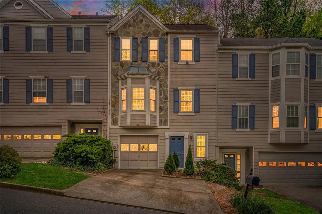 4120 Spring Cove Drive Duluth, GA 30097 - Photo 24 of 24 a front view of a house with garden