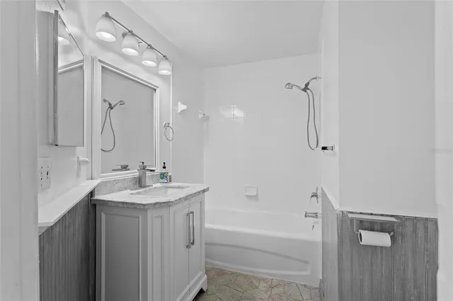 a view of a livingroom with furniture and chandelier