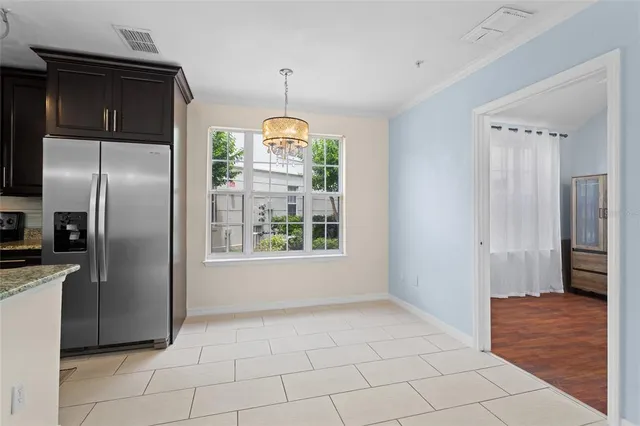 a kitchen with a refrigerator a sink and a refrigerator