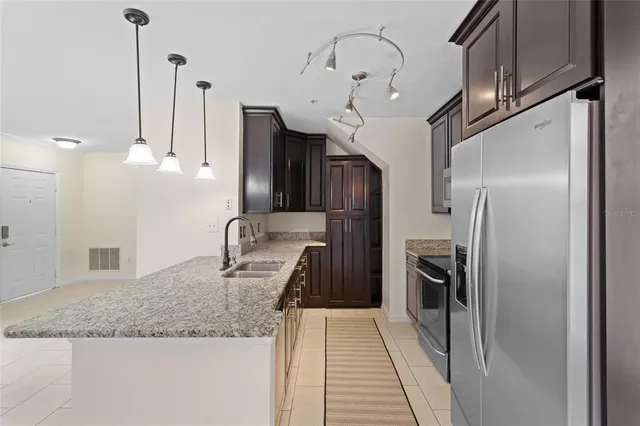 a view of a room with wooden floor wooden table and chair