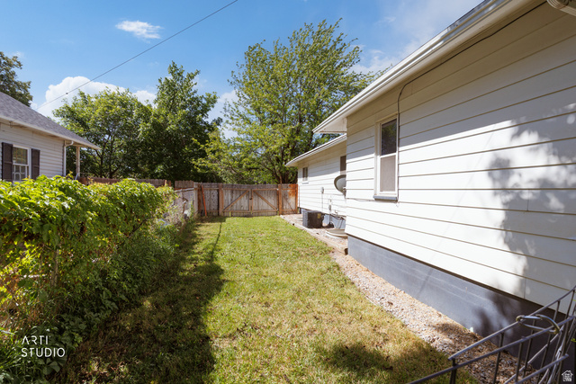 146 West 200 N Street Springville, UT 84663 - Photo 29 of 29 Expansive backyard featuring a manicured lawn, established privacy fencing, and mature perimeter foliage