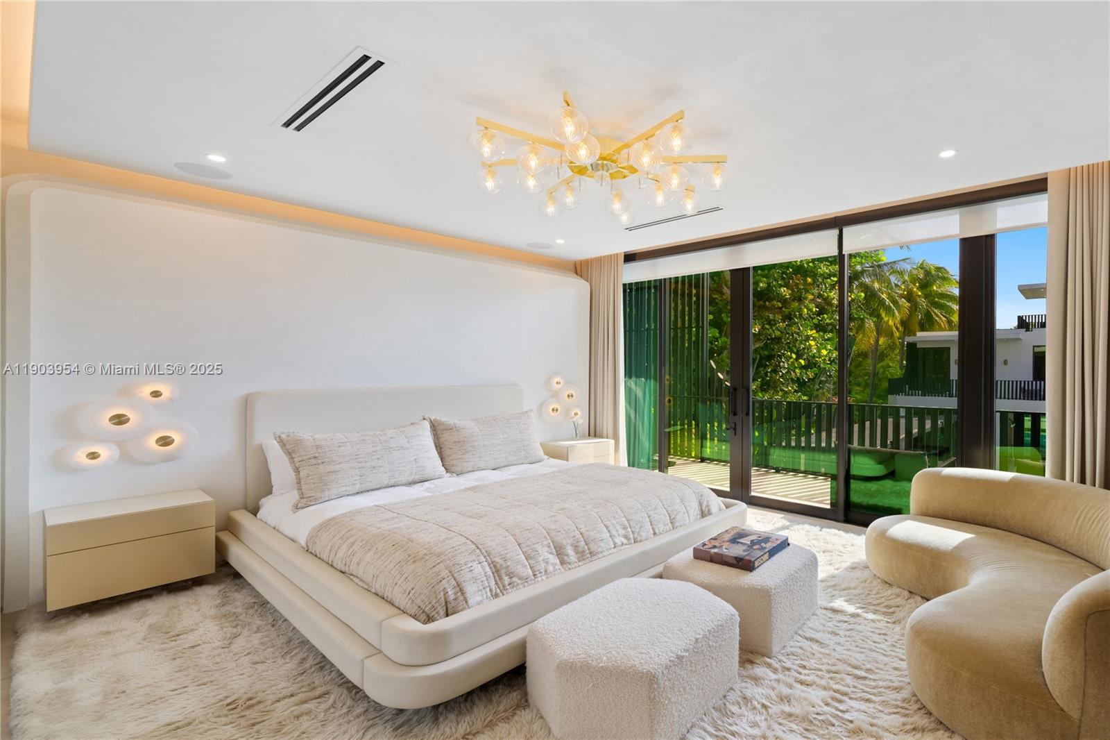 2053 North Bay Road Miami Beach, FL 33140 - Photo 12 of 99 a bedroom with a bed and a large window