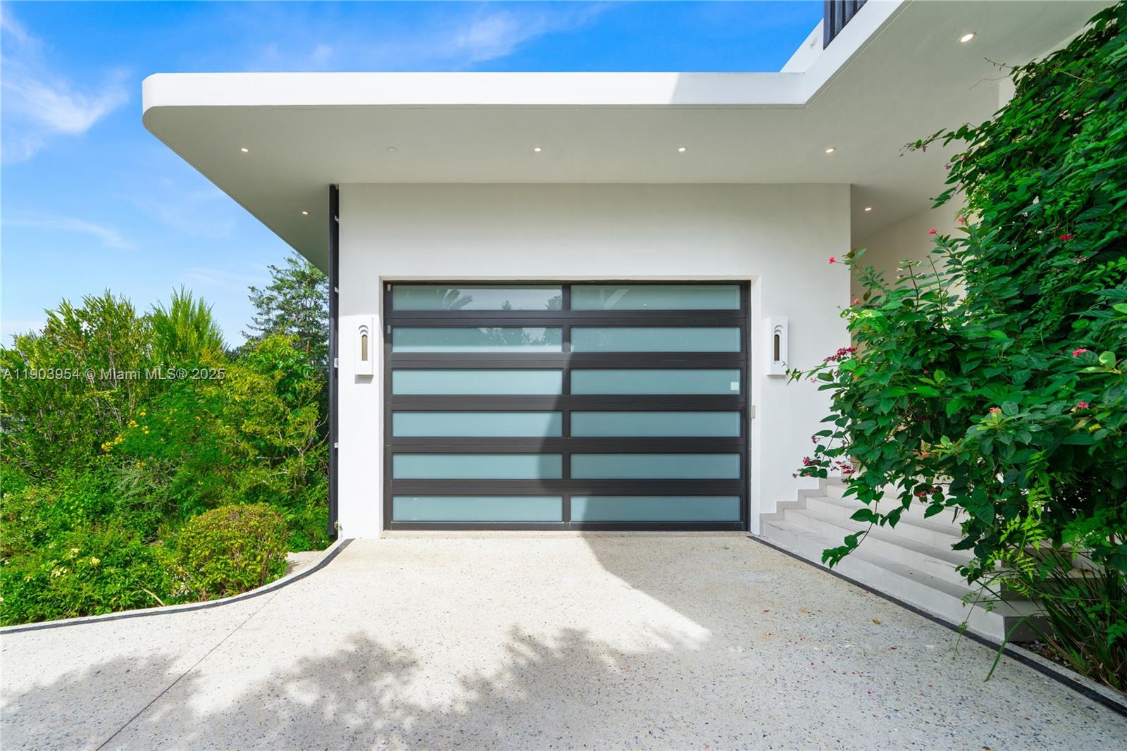 2053 North Bay Road Miami Beach, FL 33140 - Photo 26 of 99 a view of outdoor space with deck and tree