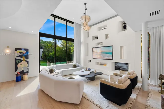 a view of a house with garden and sitting area