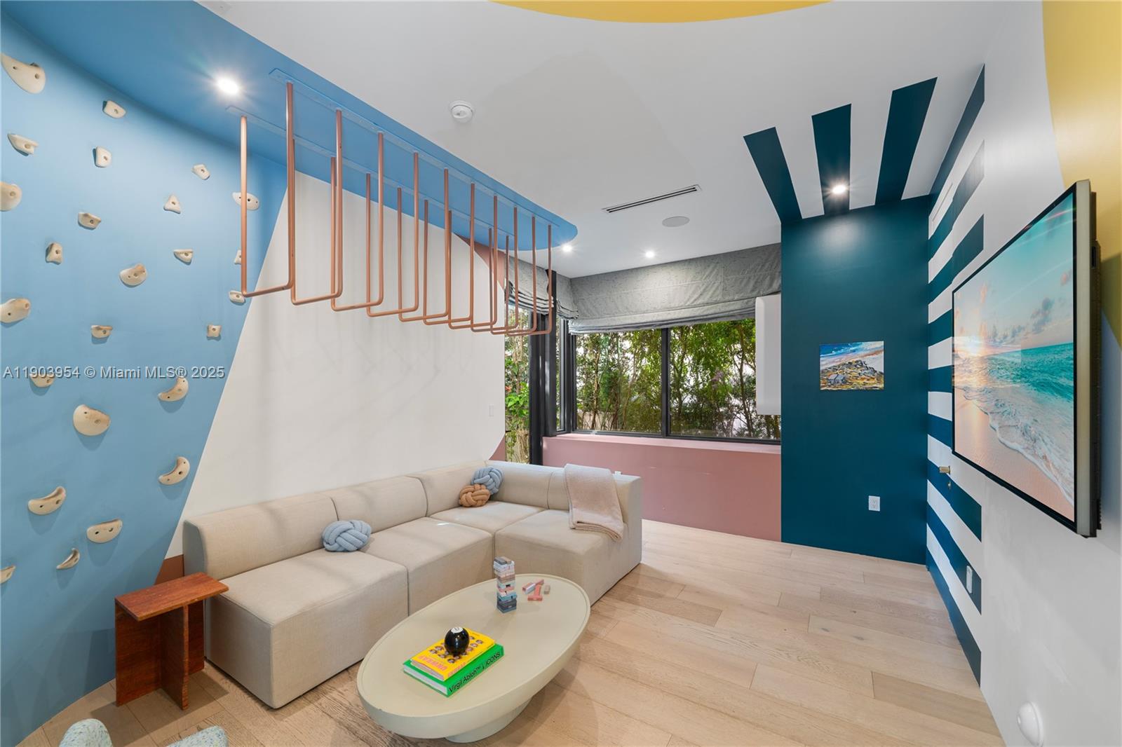 2053 North Bay Road Miami Beach, FL 33140 - Photo 36 of 99 a living room with furniture and a large window