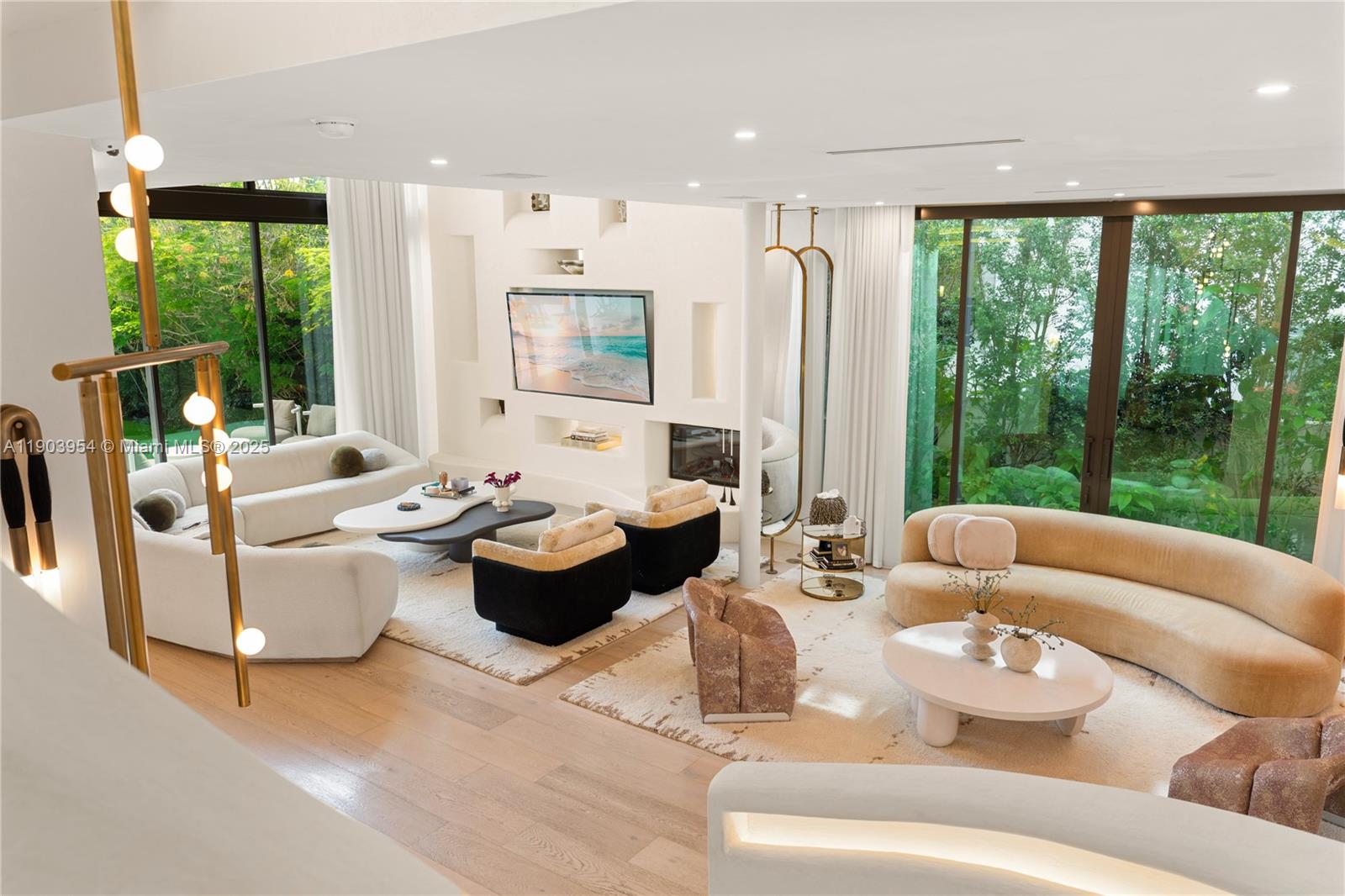 2053 North Bay Road Miami Beach, FL 33140 - Photo 39 of 99 a living room with furniture and a large window