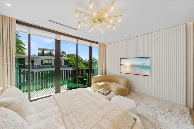 a bathroom with a glass shower door and mirror