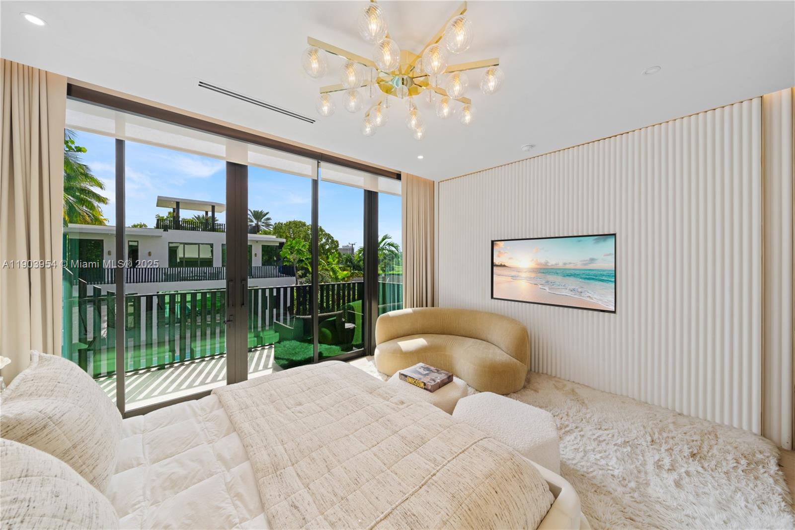 2053 North Bay Road Miami Beach, FL 33140 - Photo 41 of 99 a bedroom with a large bed and a large window