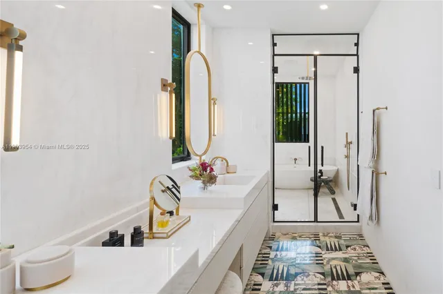 a view of a patio with couches table and chairs with plants and garden