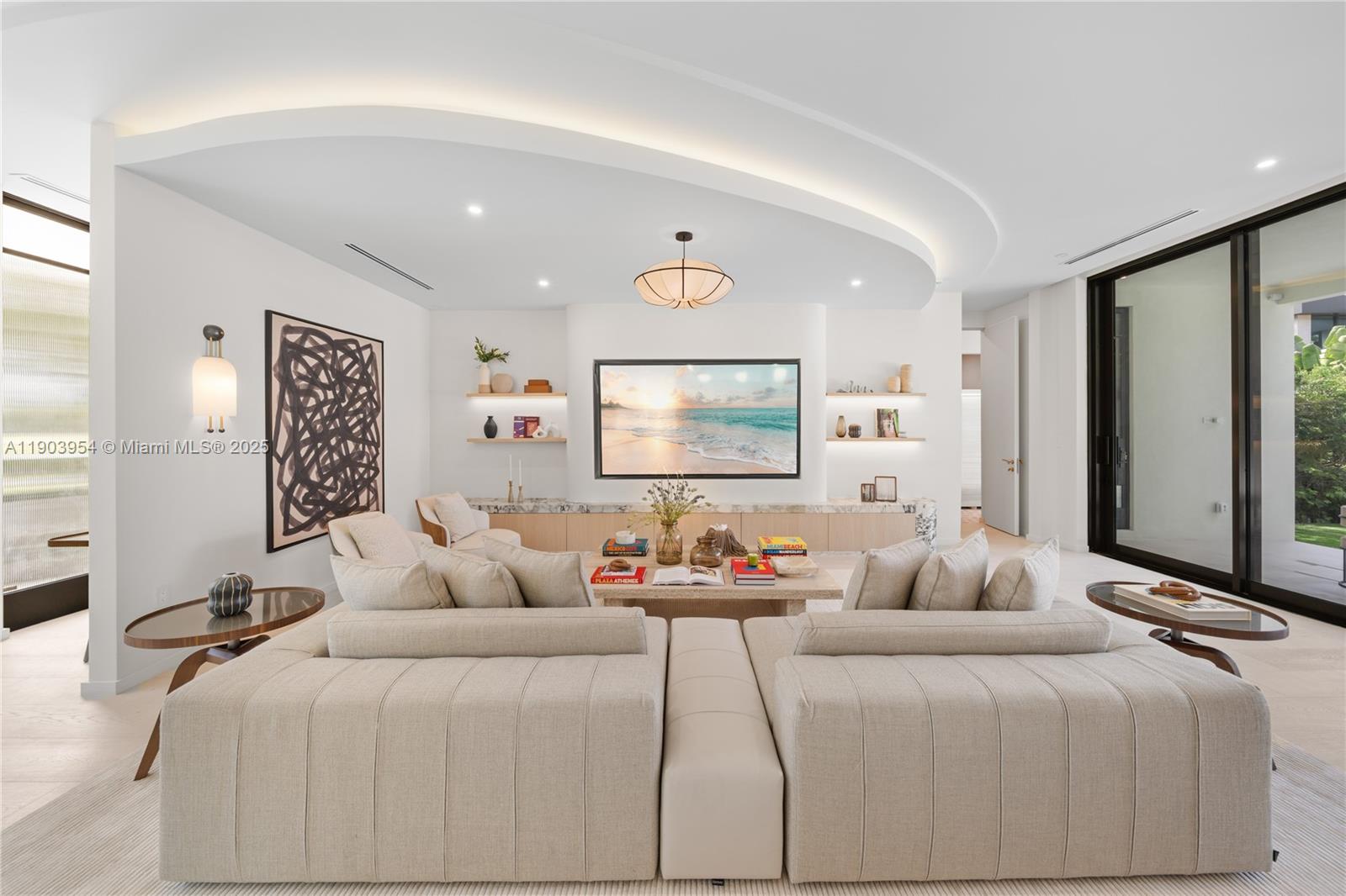 2053 North Bay Road Miami Beach, FL 33140 - Photo 67 of 99 a bedroom with a large bed and a large mirror