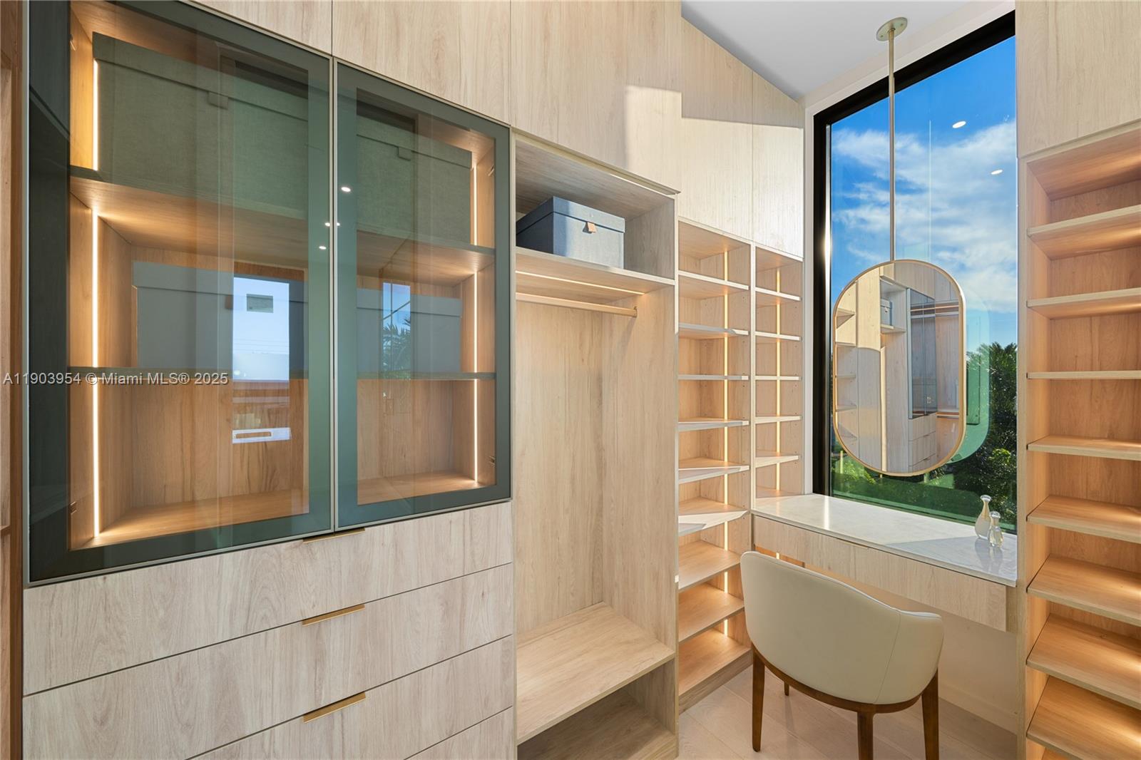 2053 North Bay Road Miami Beach, FL 33140 - Photo 81 of 99 a bathroom with a glass shower door and mirror