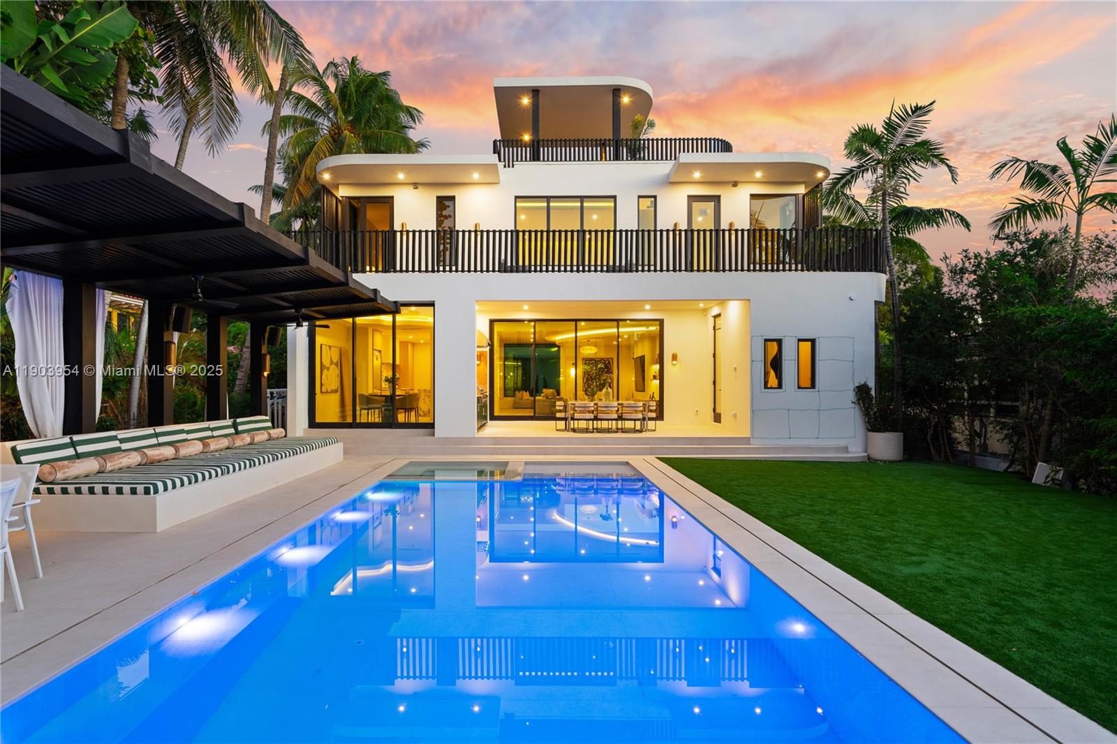 2053 North Bay Road Miami Beach, FL 33140 - Photo 96 of 99 a view of a house with a swimming pool